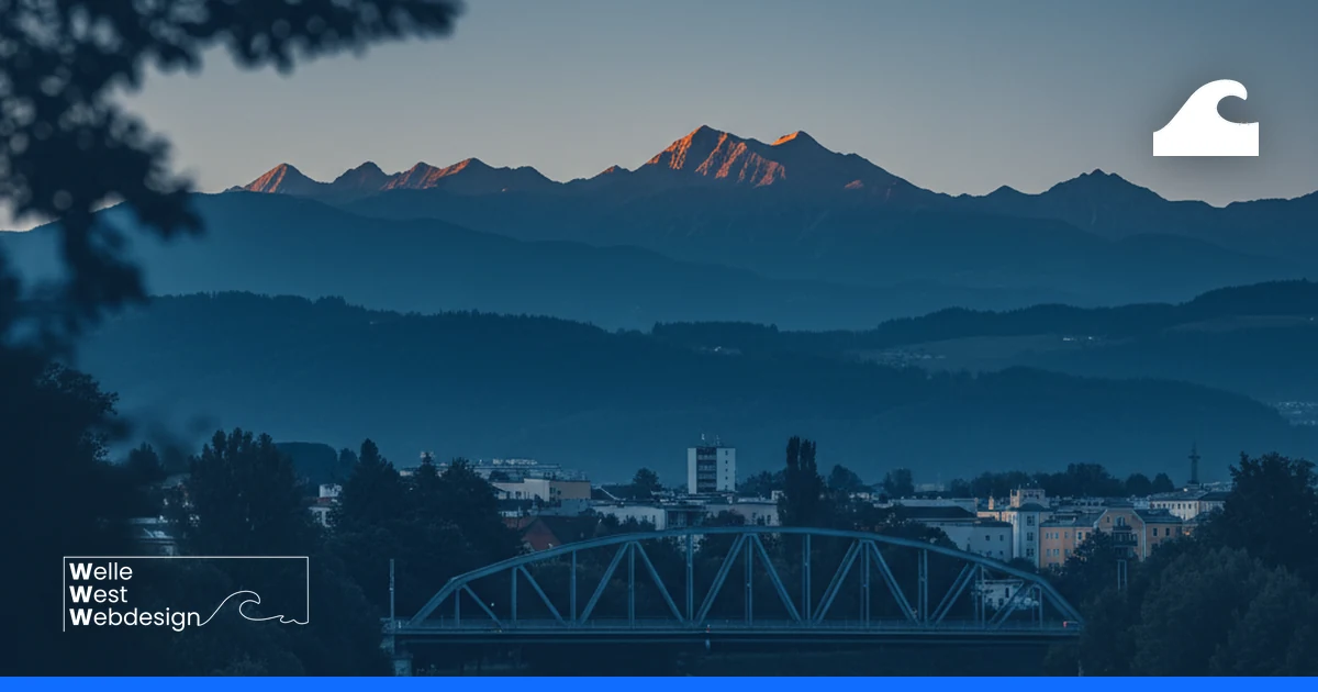 View over Villach towards the Karawanken mountains in morning light